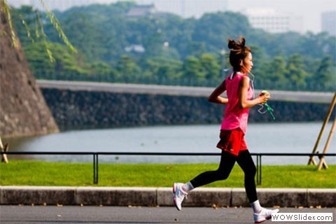 Young woman runs around imperial palace
