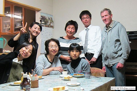 family photo around kitchen table