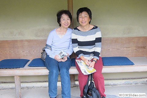 two women sitting down