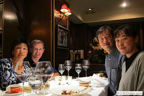 4 people dining in restaurant