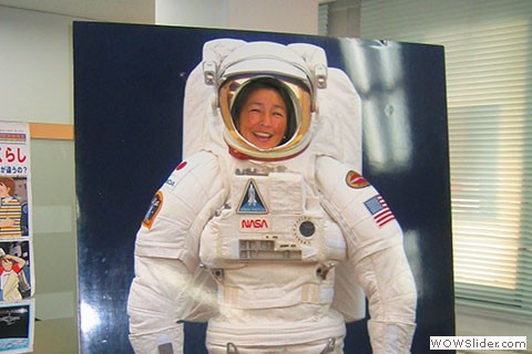 Mie - JAXA Mie wears spacesuit